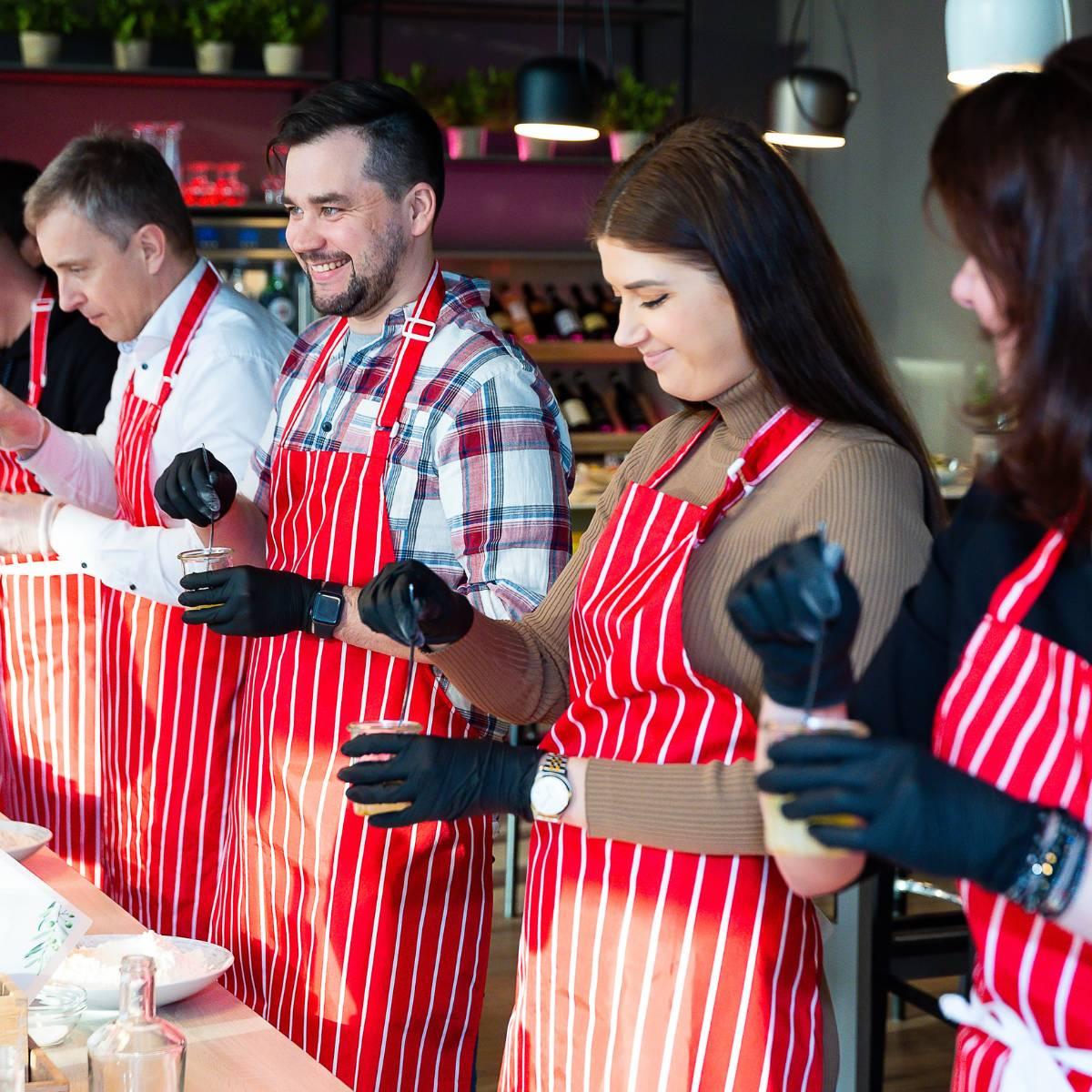 People preparing food at a cooking school