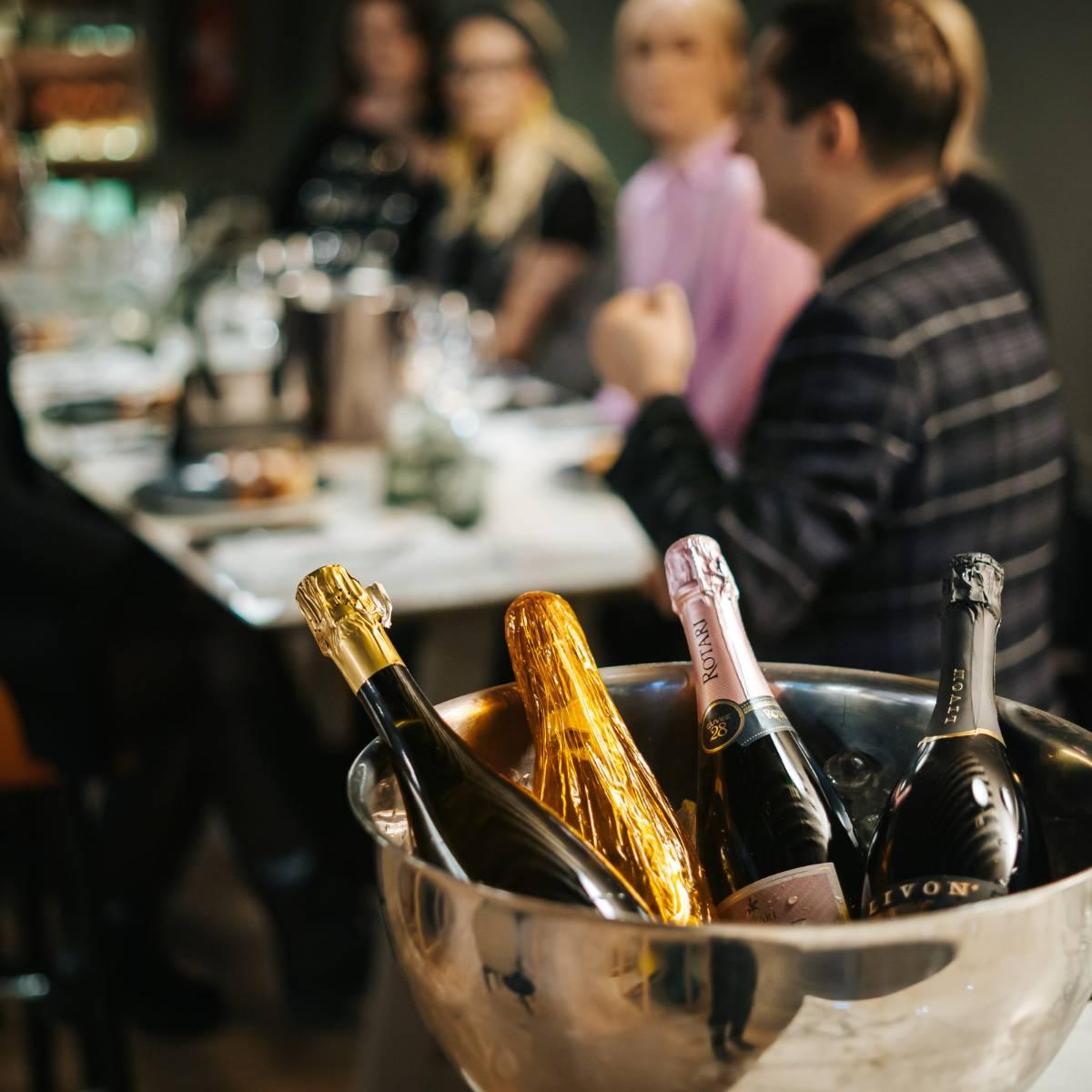 Bottles of sparkling wine in the cooler